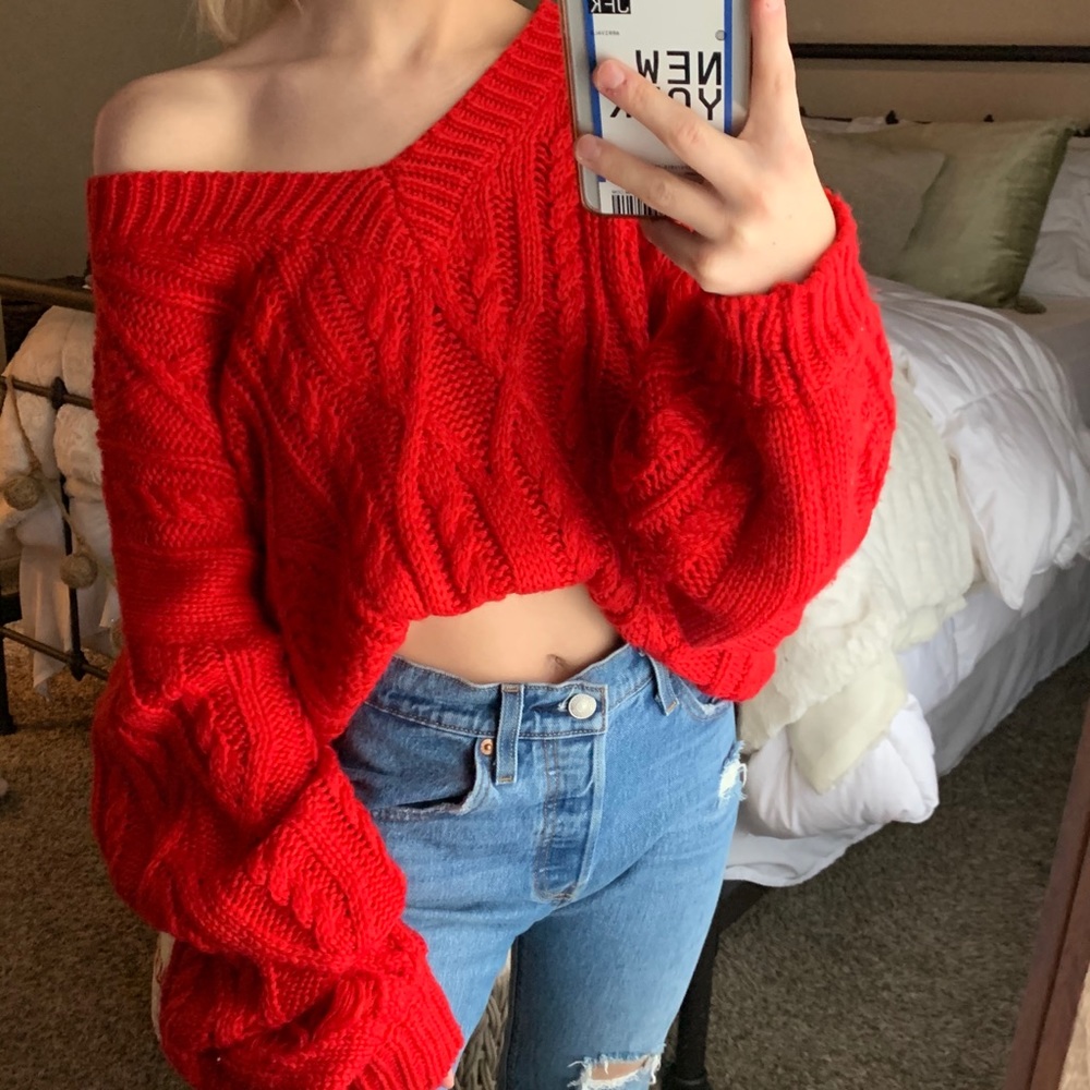 Bright red knitted sweater